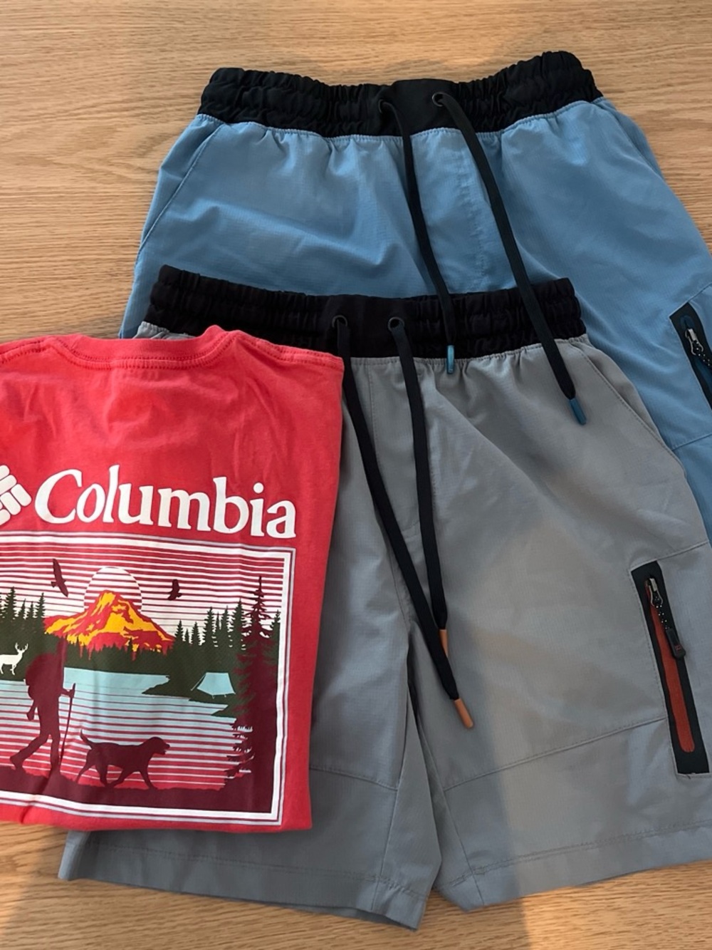Columbia Red Graphic Tee with Two Avalanche Blue and Gray Athletic Shorts